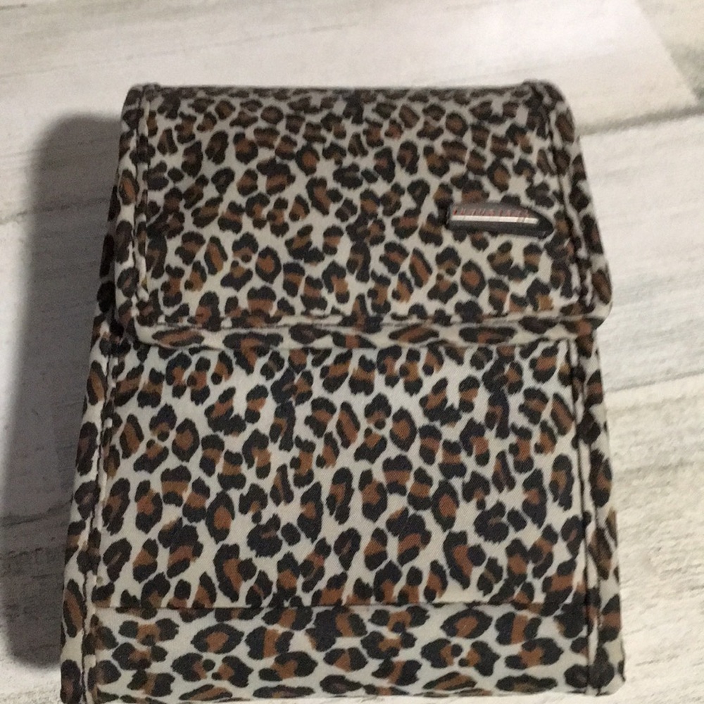 Travelon leopard cross-body passport bag with magnetic closure detachable strap